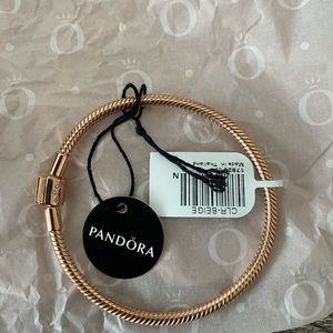 Rose gold PANDORA clasp charm bracelet